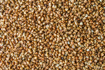 Textures from raw buckwheat grains. Healthy food. Top view.