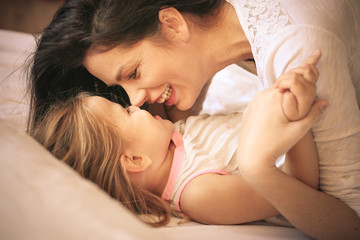 Beautiful young mother and her daughter.