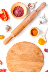 Professional kitchen with rolling-pin for cook on white backgrou