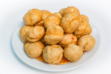 Fried fishballs and sweet sauce.