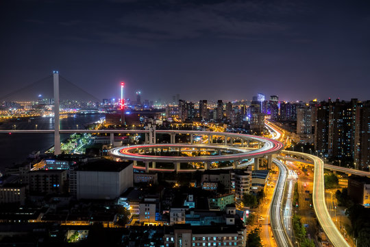Shanghai NanPu bridge traffic at night © jiajun