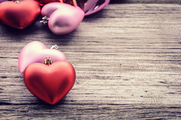 Fototapeta premium red pink heart on old wooden