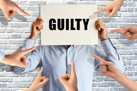 Guilty businessman judged by different people pointing fingers at him