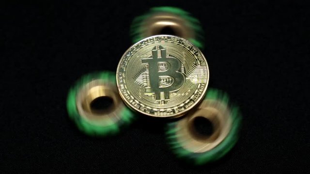 Toy spiner and coin bitcoin.