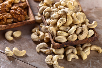 Cashews in old wooden dish
