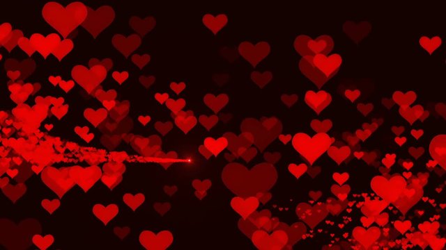 Festive abstract background with sparkling particles of hearts.