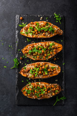 roasted sweet potato stuffed with chickpeas and quinoa