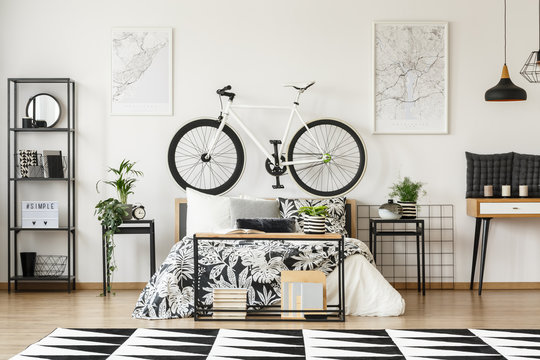 White bike between map posters