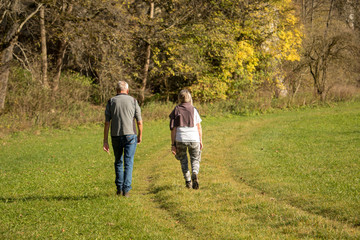 couple walk in park