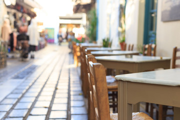 Athens, Greece. Greek tavern tables and chairs in a row