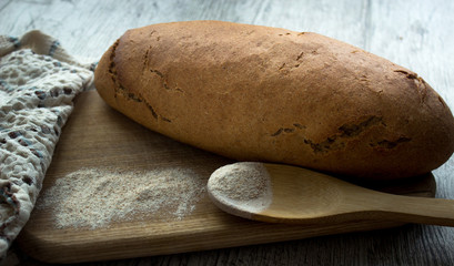 Bread rye spikelets on an old background
