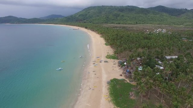 Traditional Philippine fihing village, aerial establishing shot