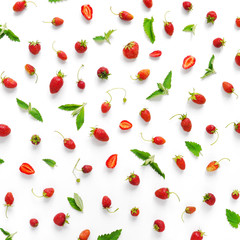 Berry pattern. Strawberries isolated on white background. Pattern of leaves of mint and strawberry. Top view, flat lay. 