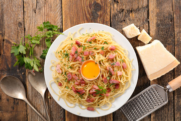 carbonara spaghetti on wood background