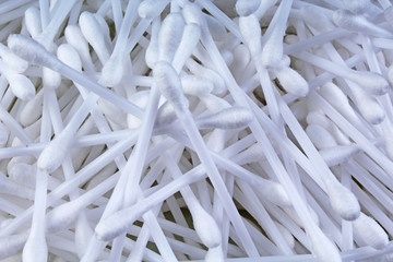 Cotton swab ear cleaning or cosmetic tool as background texture pattern. Cotton swabs. Background.