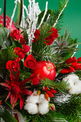 Closeup winter Christmas bouquet in green and red colors