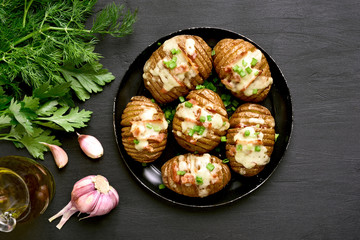 Stuffed potatoes with bacon, green onion and cheese