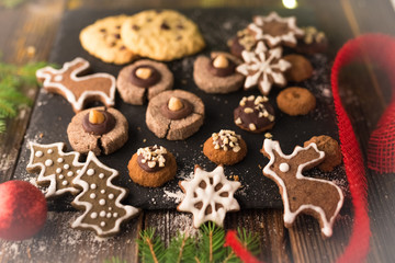 Christmas cookies on rustic wood background