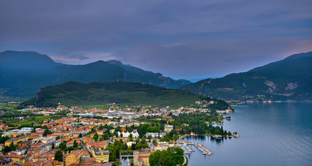 Fototapeta na wymiar View of the beautiful Lake Garda .Riva del Garda town and Garda lake in the summer time , Italy