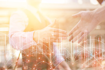 business connection success ideas concept with business handshake double exposure with city scape with line graphic ideas
