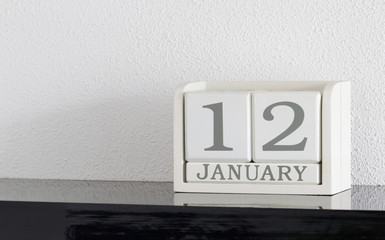 White block calendar present date 12 and month January