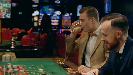 Man gambler loosing in a casino