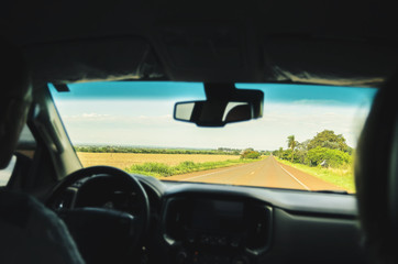 Driving on the highway, focus on the road. View from the highway from the inside of the car. Trip scene.