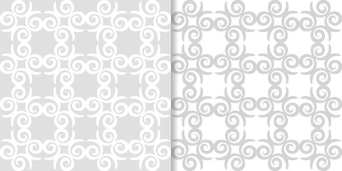 Light gray floral backgrounds. Set of seamless patterns