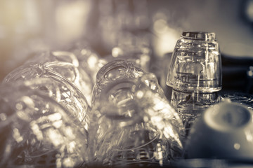 rack of empty coffee shot glass with selective focus and blur background
