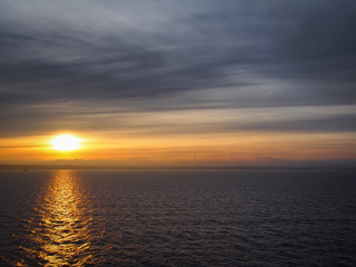 Baltic sea (Gulf of Finland) in winter, frosty weather, sea froze. Fresh ice hummocks and cracks in ice edge. Characteristic of the Northern winter low winter sun. Sunreturn