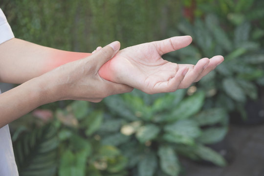 Man Holding His Wrist. Pain In A Man Wrist. Man Massaging Painful Wrist. Pain Concept.