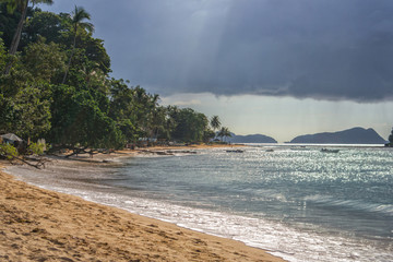 Las Cabanas beach stormy weather in Palawan island, Philippines