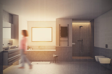White bathroom interior, gray tub, sinks blur