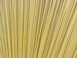 Spaghetti uncooked pasta noodles texture and pattern