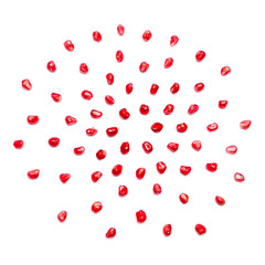 scattered pomegranate grain isolated on white