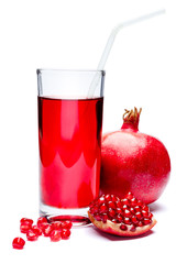 Pomegranate juice and seeds close-up