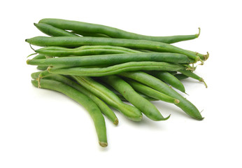 Green beans with leaves on white background