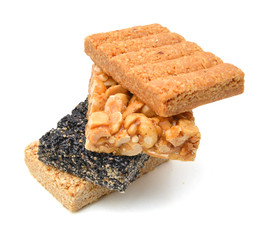 Honey bars with peanuts, sesame and sunflower seeds isolated