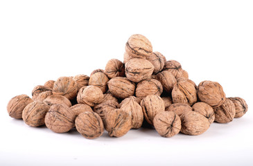 Mountain of nuts on a white background