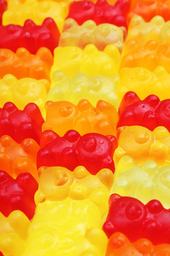 Gummy bear background. Gummy bears as texture. Gum bear candy colorful pattern. Gum bears.