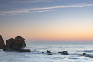 Fototapeta na wymiar Beautiful big stones in the sea in the morning time 