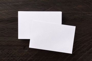 Overhead photo mockup of blank white business cards