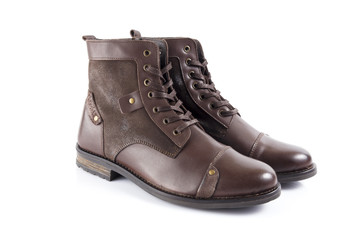 Male brown leather boot on white background, isolated product, comfortable footwear.