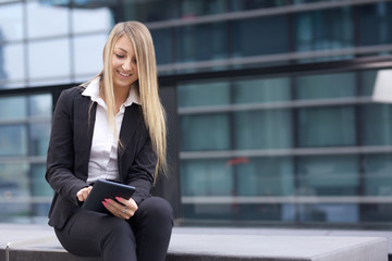 Fototapeta premium young businesswoman working with digital tablet