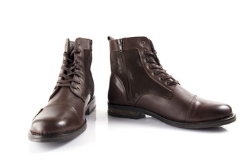 Male brown leather boot on white background, isolated product, comfortable footwear.