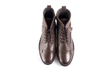 Male brown leather boot on white background, isolated product, comfortable footwear.