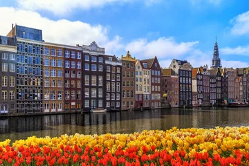 Foto op Canvas Traditional old buildings in Amsterdam. © tbralnina