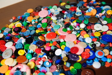 Fototapeta na wymiar Sewing buttons background. Colorful sewing buttons texture