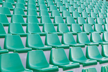 plastic blue seats on football stadium