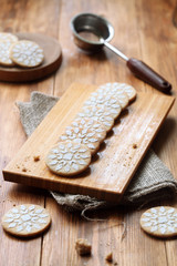 Fototapeta na wymiar Vegan Vanilla Crackers on wooden board, on wooden table